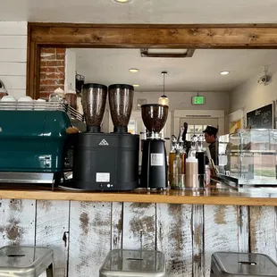 a counter with coffee machines