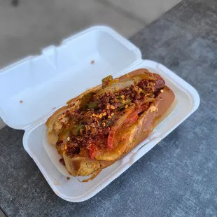 Red Dog ( All Beef Nathan's Dog Wrapped in Bacon, Spicy Red Sauce,  Chipotle Aioli)