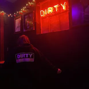 a man standing in a dark room