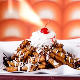 STICKY FUNNEL CAKE FRIES

Marshmallow sauce, chocolate sauce, caramel sauce, powdered sugar