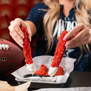 FRIED PICKLE FRIES

Beer battered bread 'n' butter pickle batons tossed in Flaming Hot Cheetos with creamy dilly ranch