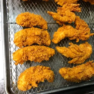 Perfectly golden, hand-breaded chicken tenders, fried to crispy perfection while staying tender and juicy inside.