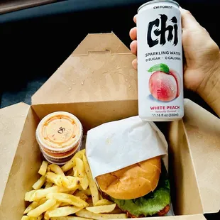 (HOT) Southern Heat Handheld Sandwich with fries and a Highly recommended sparkling peach drink by the young lady working in the front.