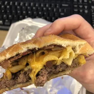 Mac and cheese burger mid-consumption