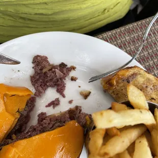 Raw meat my employee was scraping out in an attempt to eat the cooked parts of the burger.