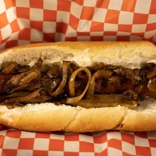 a hot dog with onions and onions