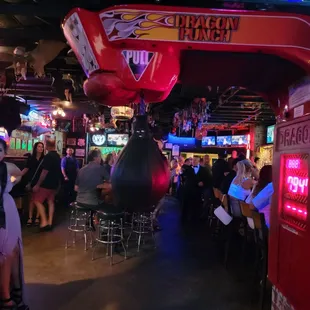 a group of people at a bar