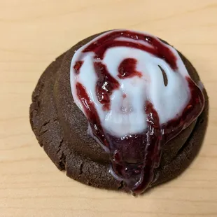 @endoedibles Instagram 08/30/24  Chocolate Raspberry Cookie - Triple Chocolate Cookie, White Chocolate Chips, Raspberry Filling, Icing