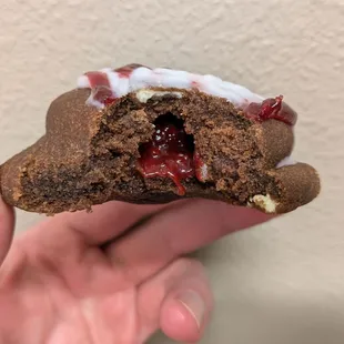 @endoedibles Instagram 08/30/24  Chocolate Raspberry Cookie - Triple Chocolate Cookie, White Chocolate Chips, Raspberry Filling, Icing