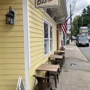tables and chairs outside a restaurant