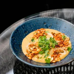 Corn and Berbere Bisque // crunchy corn, lobster, pickled shallots