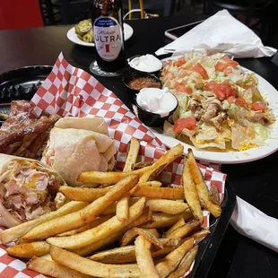 a plate of fries and a sandwich