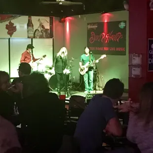 a band playing on stage