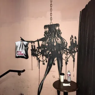 Awesome wall art by Punk Me Tender at the top of the stairs (when you walk up)