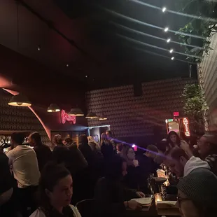  crowd of people at a bar