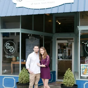 Owners, Carvel &amp; Ashley, outside of the shop