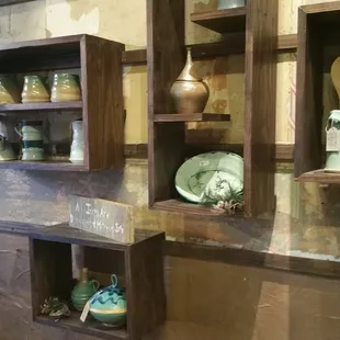 Some of their functional pottery displayed.