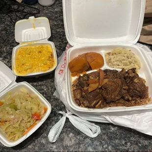 Brown Stew Chicken S - Mac and Cheese S - Steamed Cabbage S - Candied Yams Garlic Mashed Potatoes