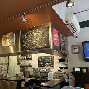 a restaurant counter with menus