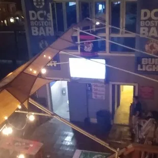 Drinking, bar game area. Open to the sky.