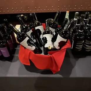 a table full of wine bottles