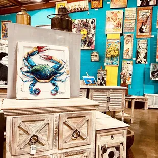 Big Blue Crab hand painted on a reclaimed door from a storm damaged home in Nola by local artist,  Paige DeBell.