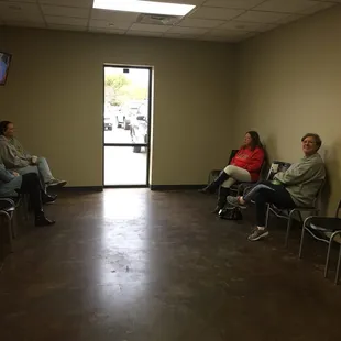 Discount Auto Glass and Tire customers relaxing in our clean and spacious waiting room.