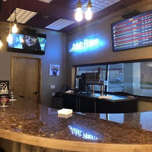 the counter and seating area of a restaurant