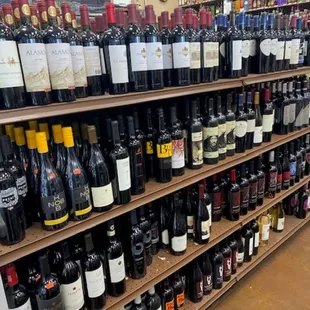 a large selection of wine bottles