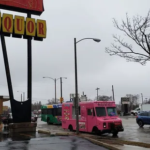This is genius for a food truck, you have walk past the truck from the lot to enter the store.