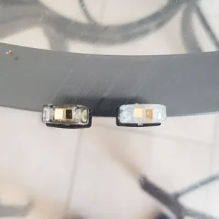 Real on the right fake on the left notice the difference in metal used. SHAME