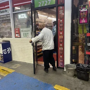 a man entering a store
