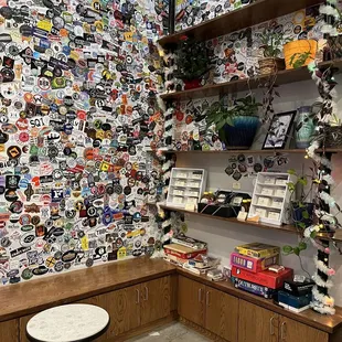 a wall of stickers on the wall