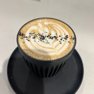 a cup of coffee on a saucer