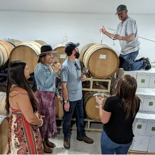 Mike Dorner providing barrel tastings to tour guests.