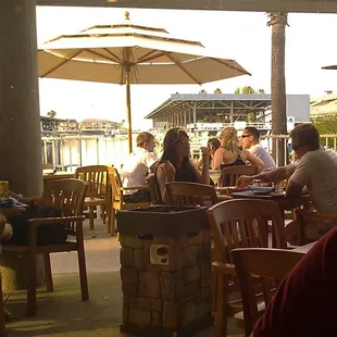 Diners enjoying meal at Boardwalk Grill on the Harbor.