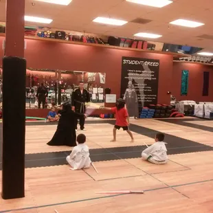My son dueling a sith