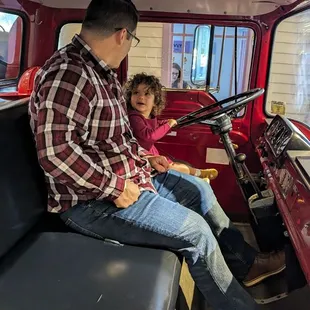 Playing in a real fire truck!