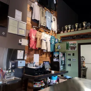 some merch behind the bar