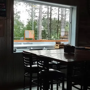 view of the large patio &amp; a giant connect 4 game