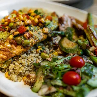 Grilled Salmon w/ Basil-Tahini Sauce ($22) comes w/ two sides: Salad &amp; Grilled Veggies pictured here