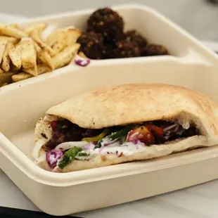 Sumac chicken pita with fries and falafel