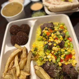 Beef Kabob with rice, fries, and Falafel