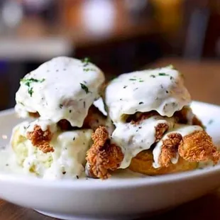 fried chicken and biscuits with gravy