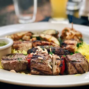 Combo kebab with chicken, kufta, and beef, with seasonal vegetables