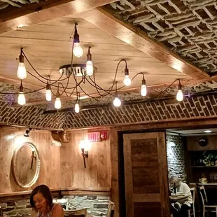 Basement dining area. Nice decor and ambiance. Rustic meets modern styles.