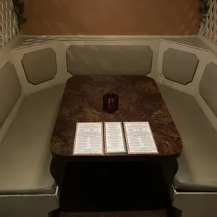 YELP Elite "Review" (in his original review) Claimed that our "upholstery is covered with stains and cigarette burns"  This is Booth #1