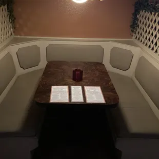 YELP Elite "Review" (in his original review) Claimed that our "upholstery is covered with stains and cigarette burns"  This is Booth #6