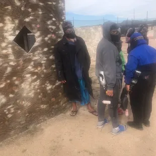 Grandpa wearing his slippahs and lava lava to go paintballing!