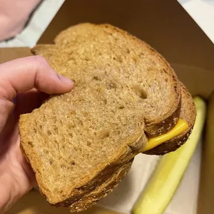 Two pieces of bread with a piece of cheese that they put in the microwave and sent it to me as a grilled cheese.